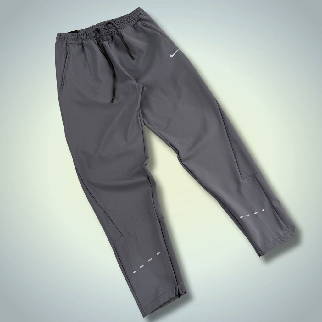 Nike pánske nepremokavé športové nohavice, grafitové. Prémiová kvalita