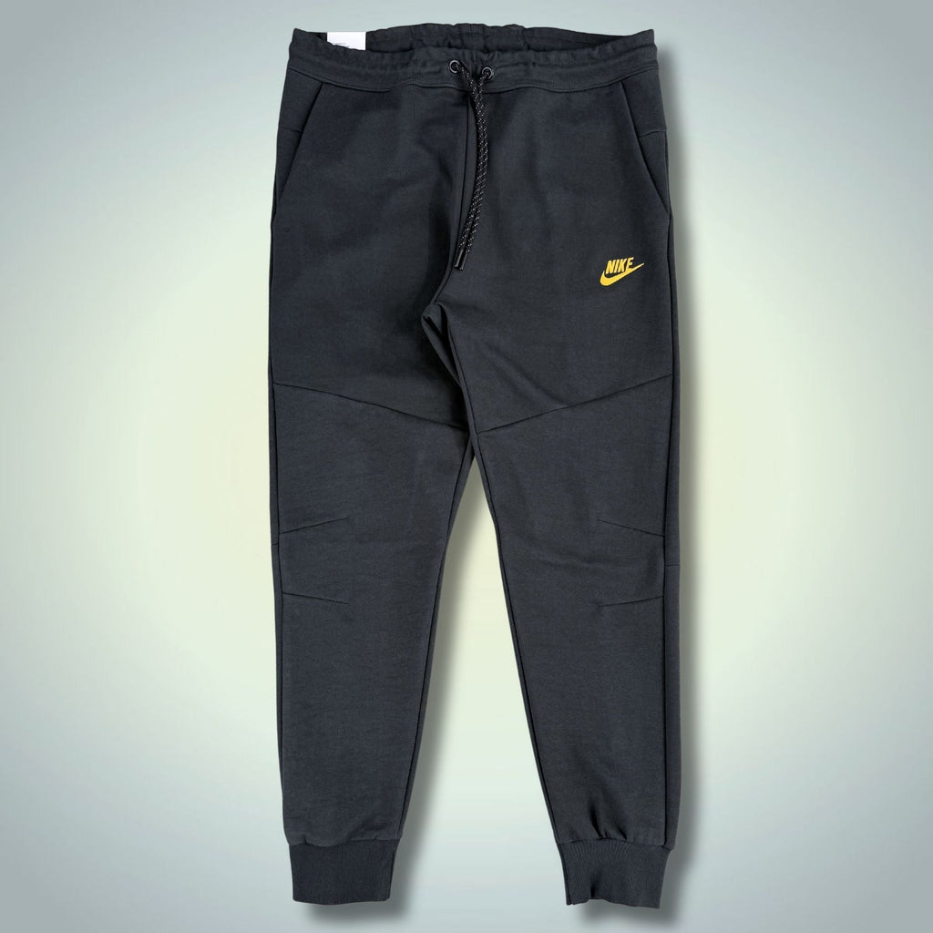 Nike Tech Fleece pánske športové nohavice, grafitové, žlté logo. Premium kvalita